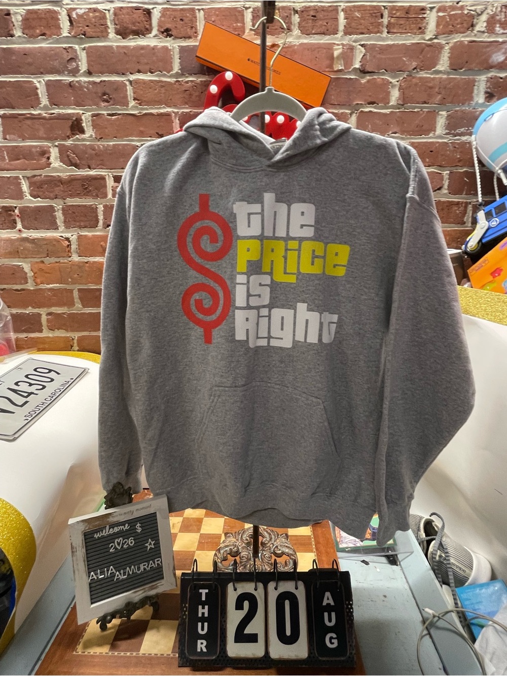 gray pullover hoodie game show prices right
